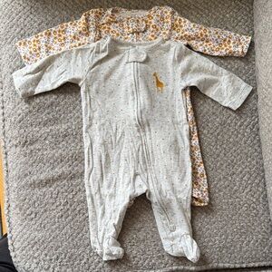 NWOT Set of 2 Child of Mine by Carter’s sleeper footies 0-3 months
